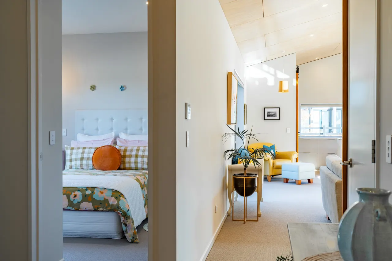 Hallway from the living area to the bedroom suites