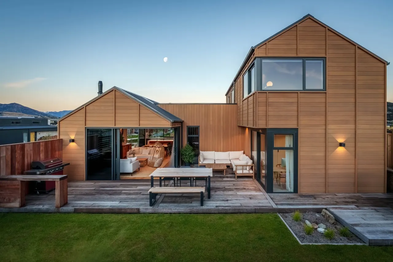 Outdoor living courtyard and landscaped lawn