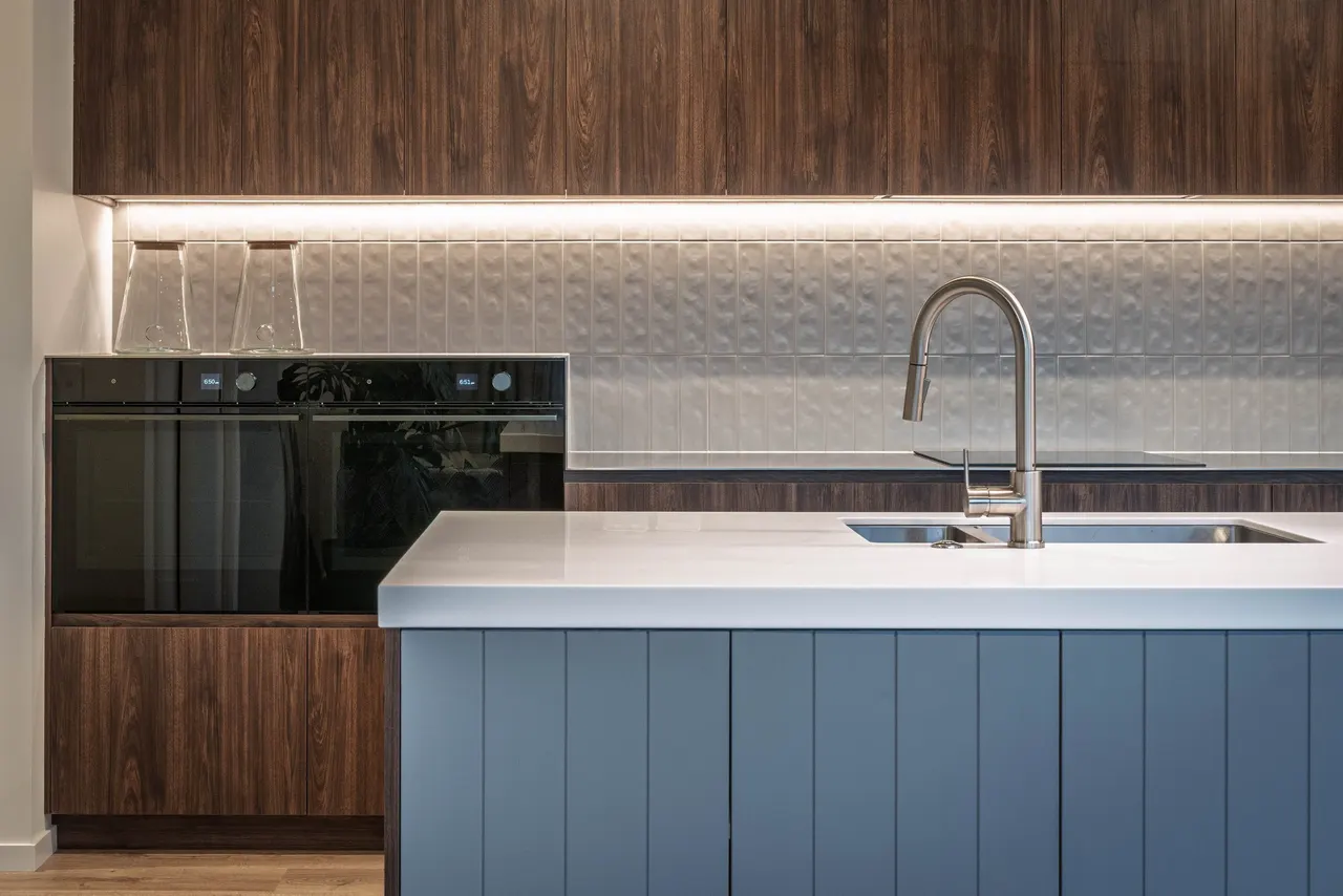 Detail of kitchen cabinetry finish and benchtop